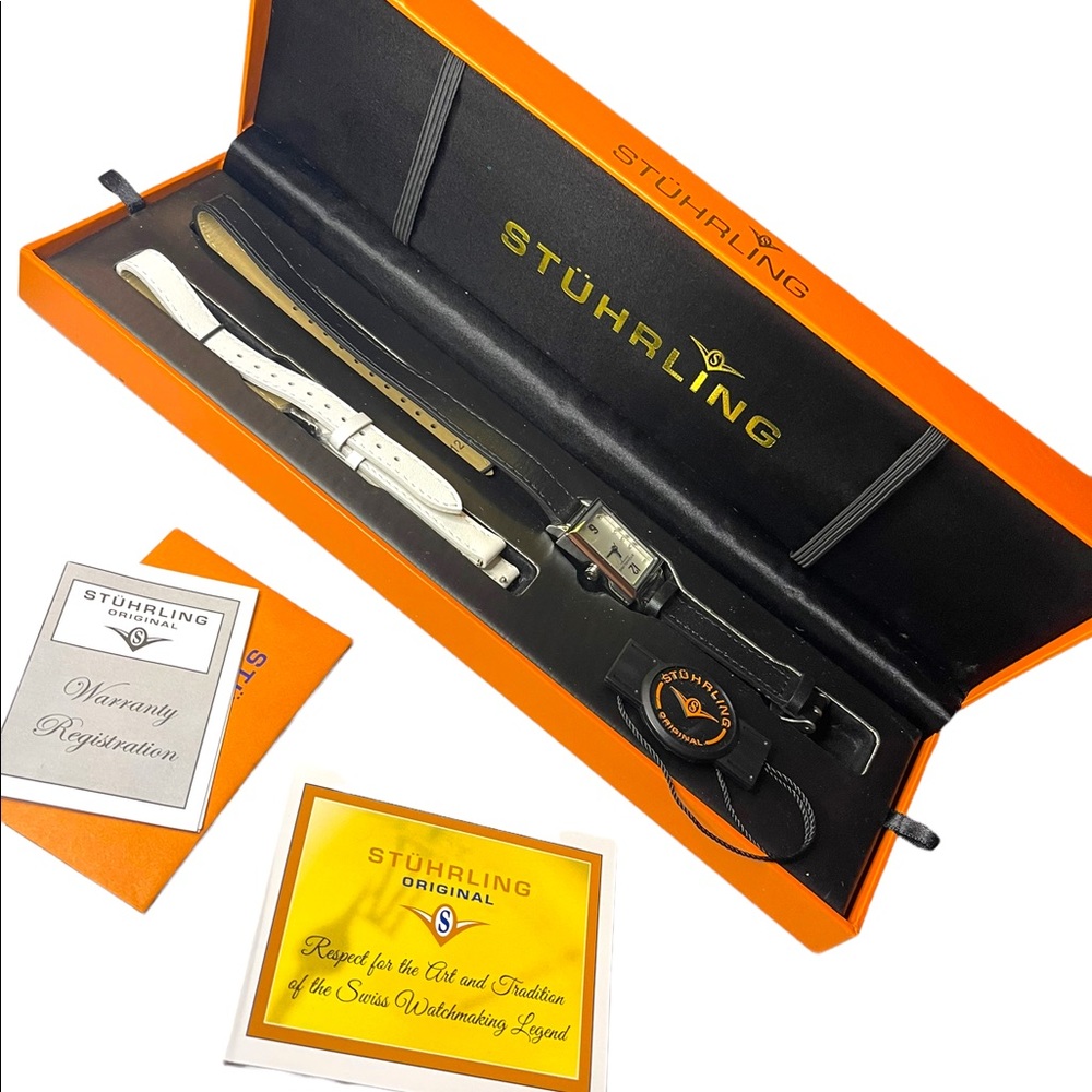 - NIB STUHRLING Origional womens watch with leather bands box papers